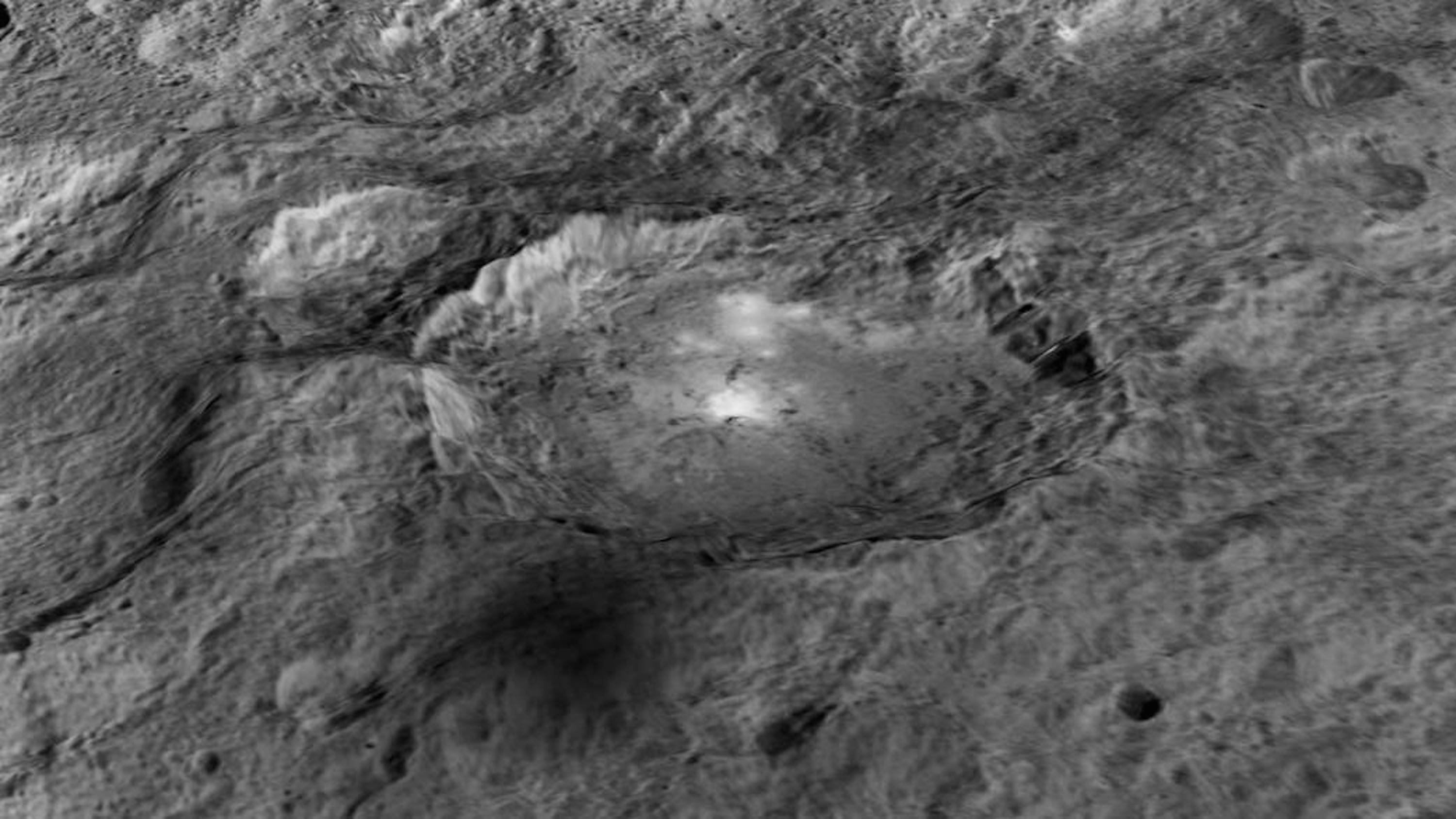 Ceres bright spot in in a crater named Occator, which is about 4 km deep